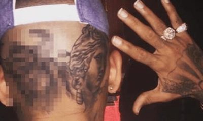 https://fmhiphop.com/wp-content/uploads/2015/08/Chris-Brown-adds-second-tattoo-to-the-back-of-his-head-this-time-a-bull.png